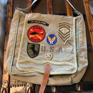Military memorabilia with this crossover purse